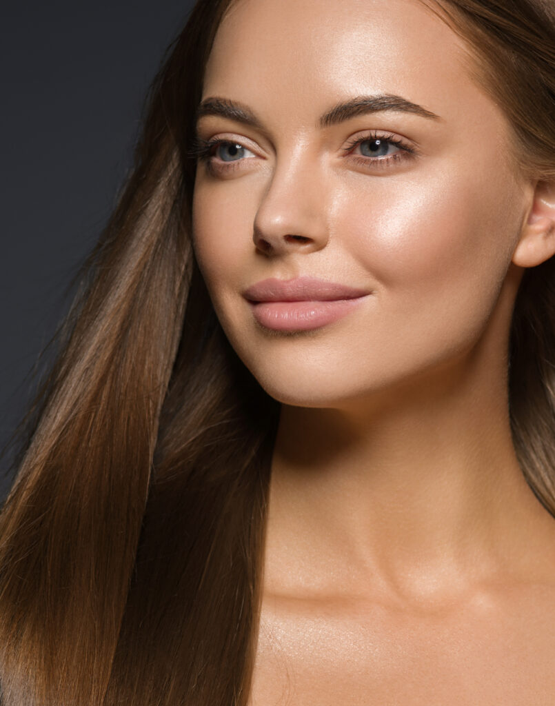 Young woman beautiful face healthy skin natural make up spa clean fresh skin