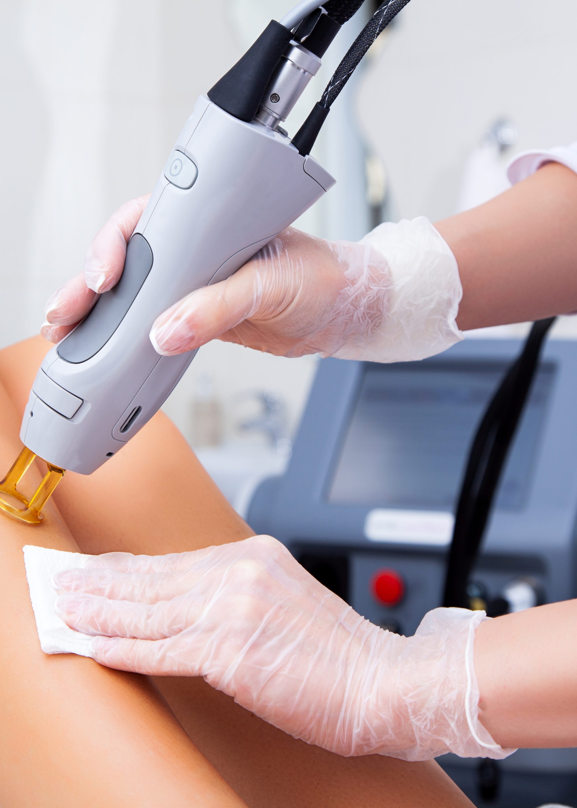 Close-up of a female cosmetologist in a medical coat
